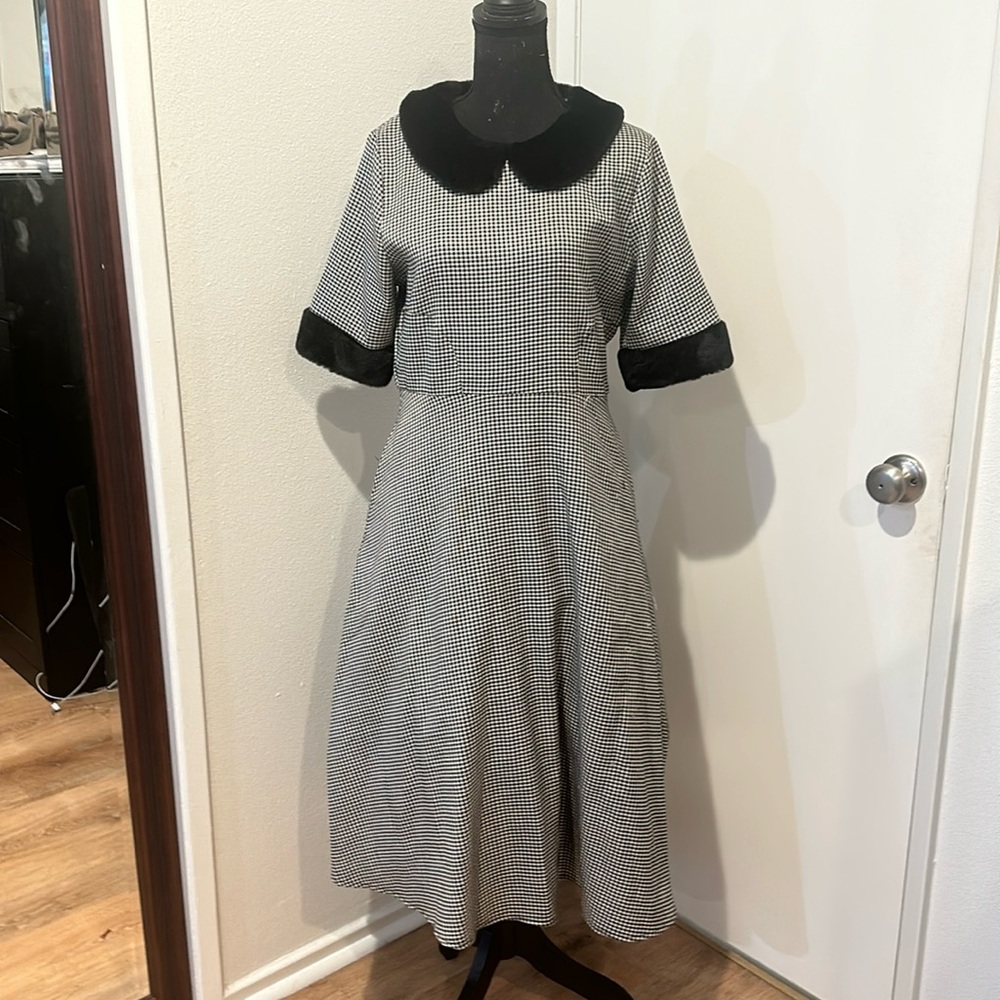 Houndstooth pattern dress in black and white with furry collar and cuff sleeves